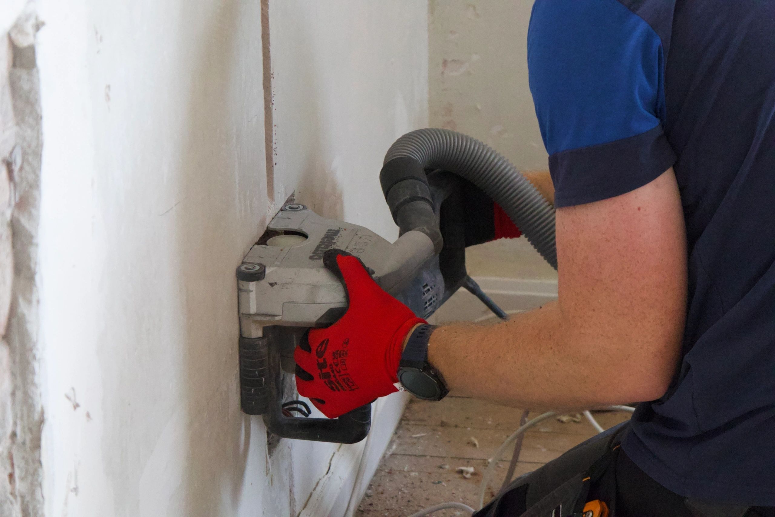 Electrician carrying out a full house rewire